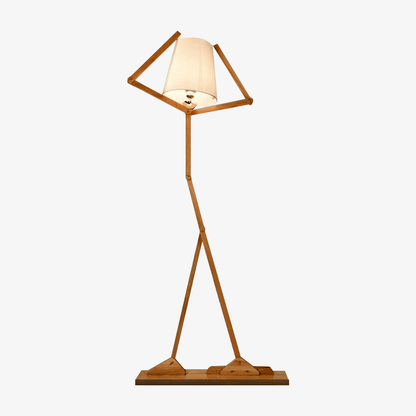 Original golvlampa i trä i form av en man med tyg lampskärm