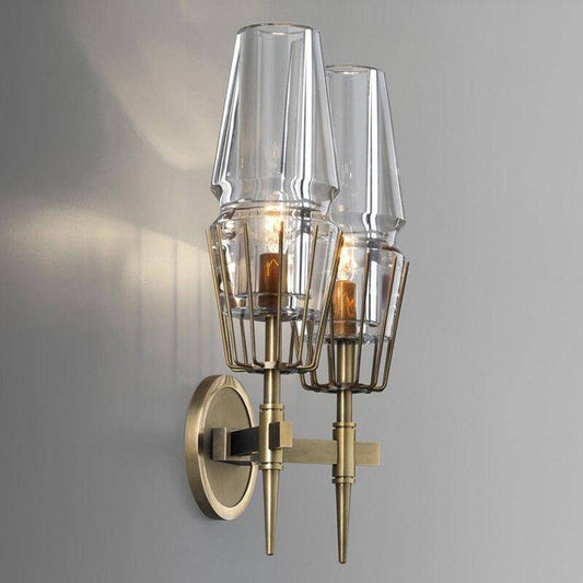 Designer LED-vägglampa med metallstöd och lampskärm i glas