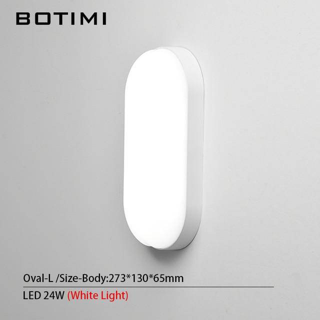 Modern vit LED-vägglampa inomhus