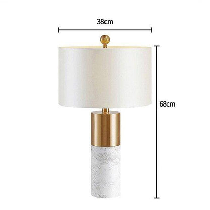 Designer LED bordslampa i guldcylindrisk form och marmor