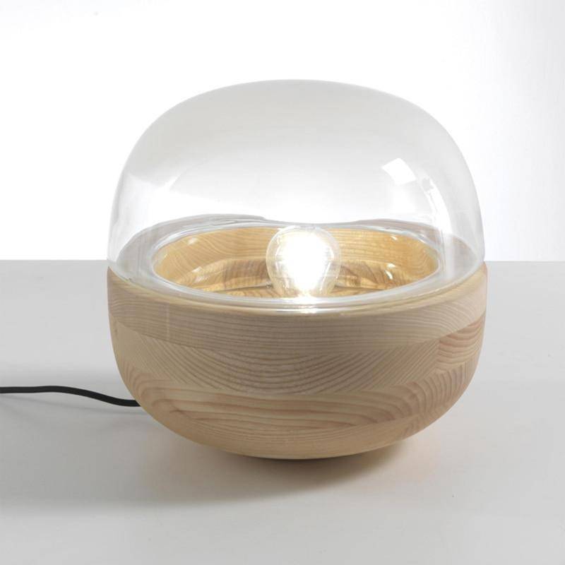 Modern LED-bordslampa med träfot och rundad glasfot
